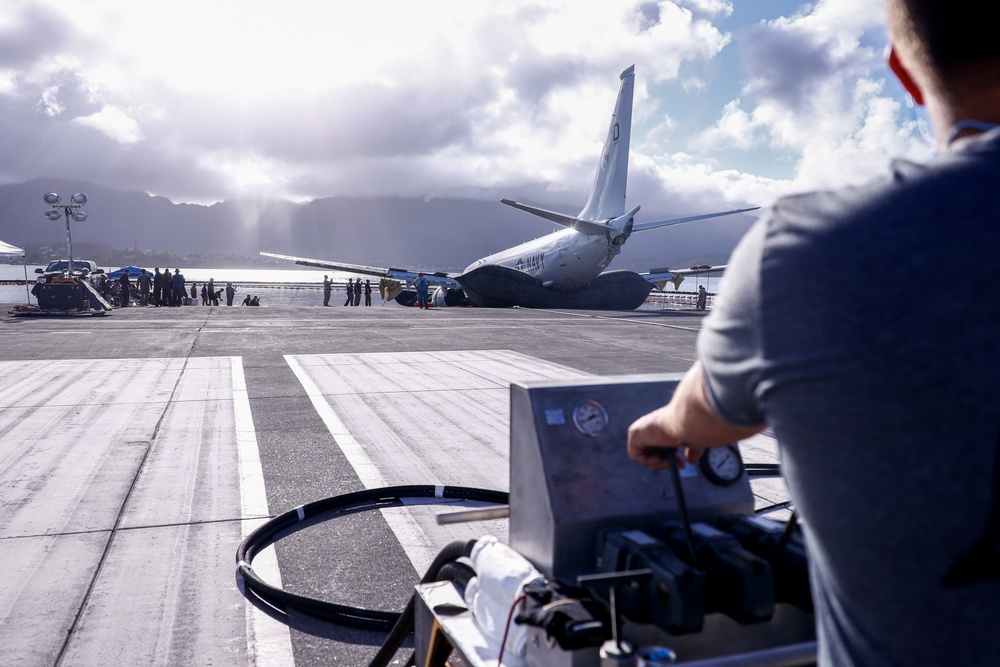 Experts Work to Extract U.S. Navy P-8A Poseidon From Kaneohe Bay