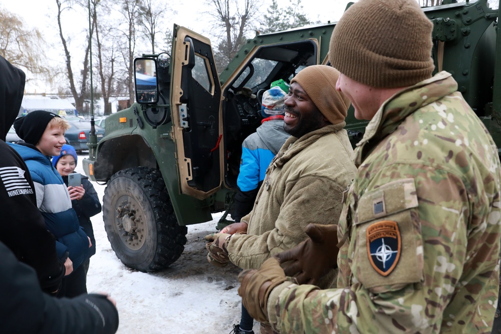 2-69 Armored Regiment Soldiers help local Polish town celebrate holiday event