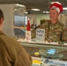 The 114th Fighter Wing leadership serve holiday meal to Airmen