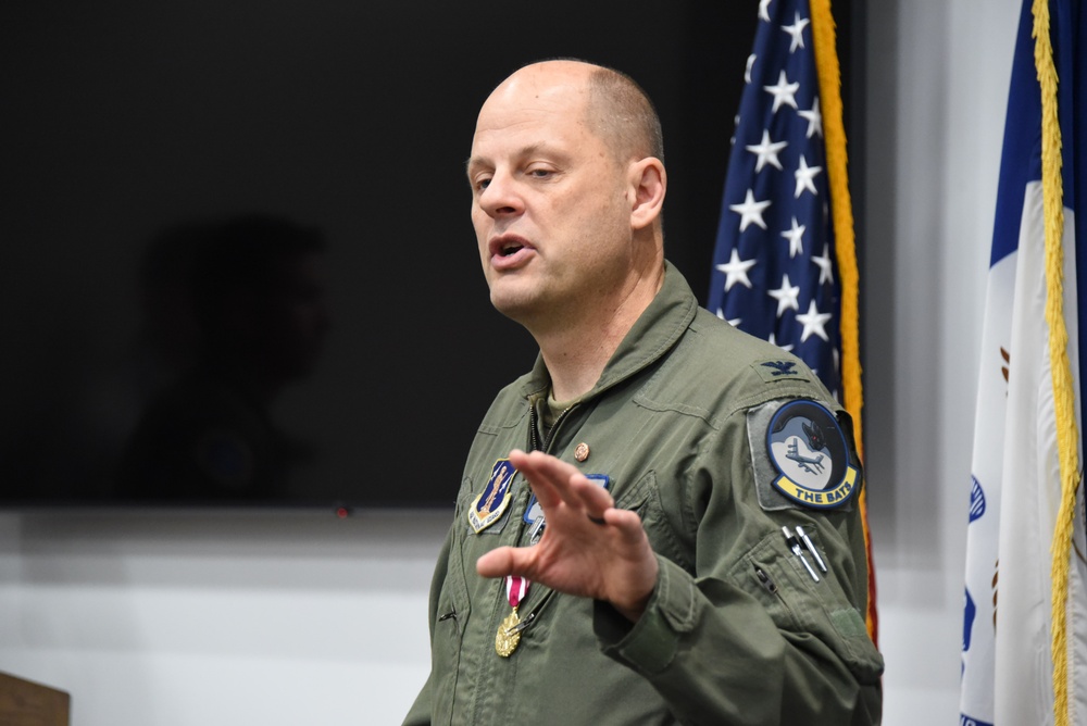 Alons speaks at his retirement ceremony