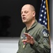 Alons speaks at his retirement ceremony