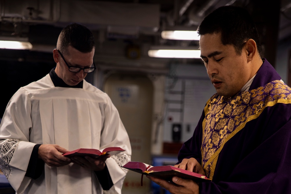 Father Emmanuel Banico visits the USS Philippine Sea