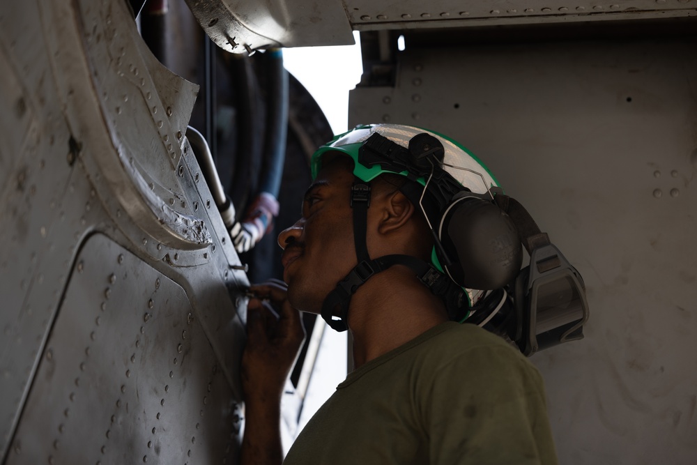 Marine Medium Tiltrotor Squadron (VMM) 261 (Rein.) Marines conduct daily maintenance