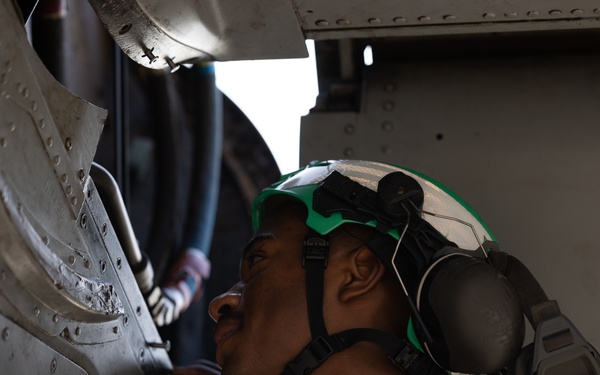 Marine Medium Tiltrotor Squadron (VMM) 261 (Rein.) Marines conduct daily maintenance