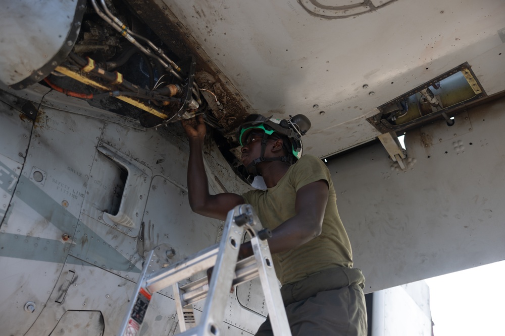 Marine Medium Tiltrotor Squadron (VMM) 261 (Rein.) Marines conduct daily maintenance