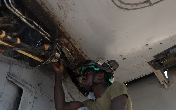 Marine Medium Tiltrotor Squadron (VMM) 261 (Rein.) Marines conduct daily maintenance