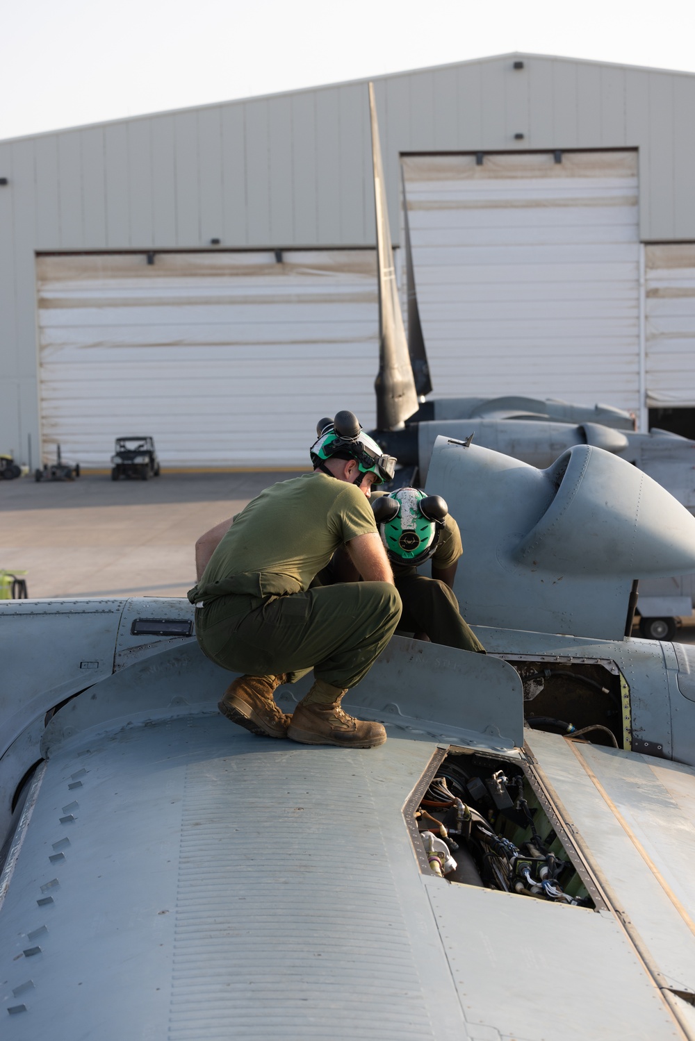 Marine Medium Tiltrotor Squadron (VMM) 261 (Rein.) Marines conduct daily maintenance