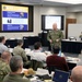 Master Chief Petty Officer of the Navy James Honea speaks to region commanders and leadership during the annual CNIC Executive Steering Committee