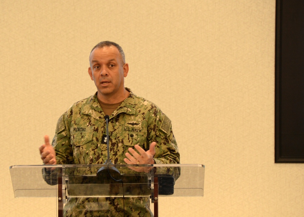 Rear Adm. John Menoni, acting commander of Navy Installations Command (CNIC) speaks to region commanders and leadership during the annual CNIC Executive Steering Committee