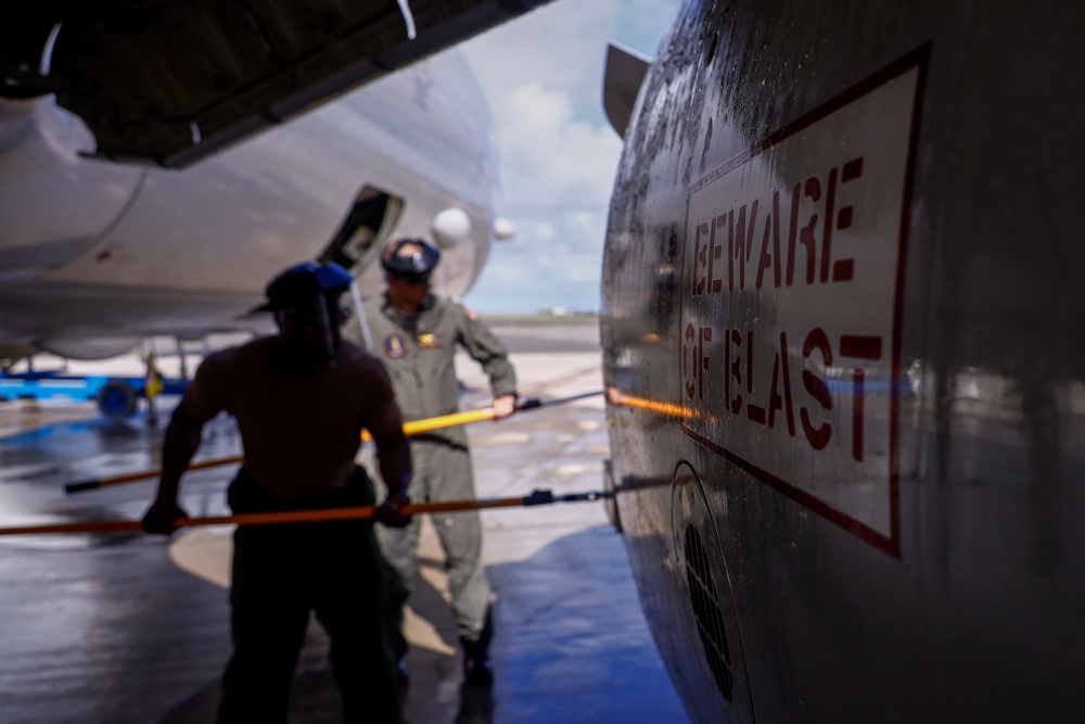 Sailors Wash a P-8A Poseidon after Extraction from Kaneohe Bay