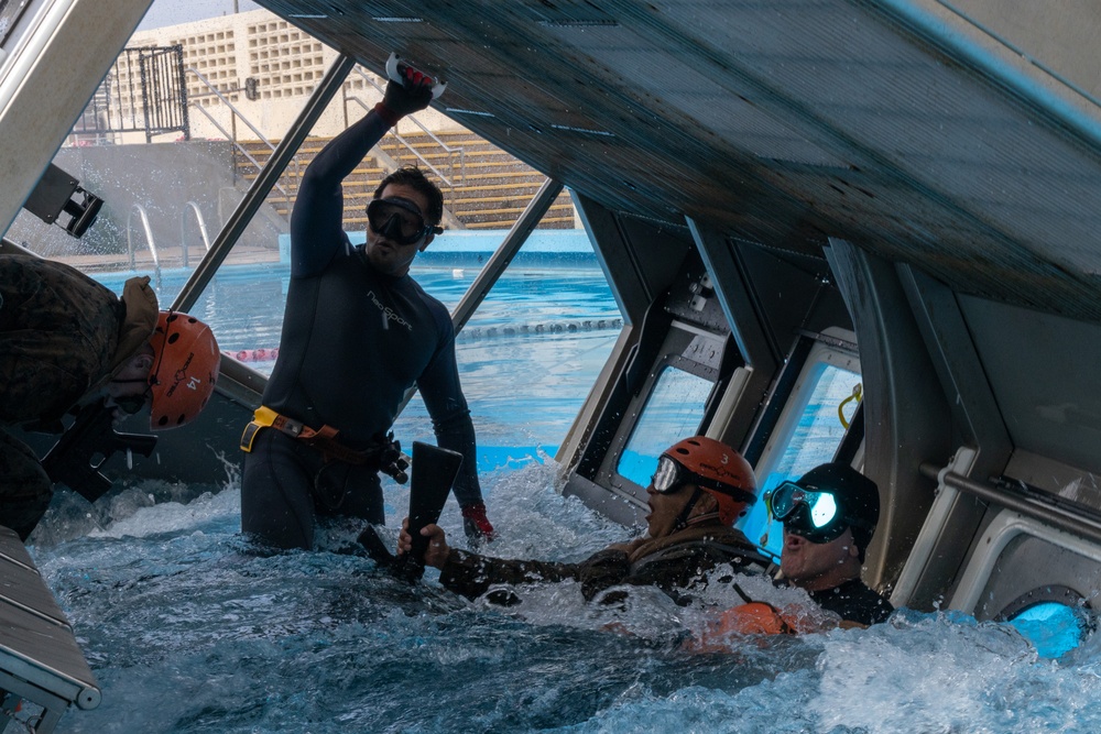 U.S. Marines from III Marine Expeditionary Force conduct Underwater Egress Training