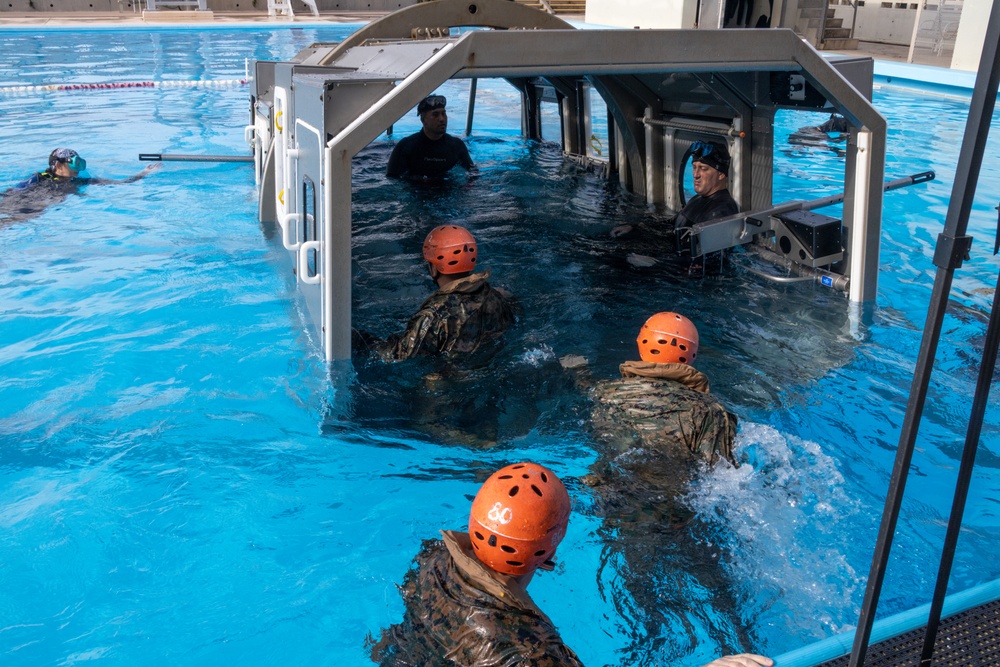 U.S. Marines from III Marine Expeditionary Force conduct Underwater Egress Training