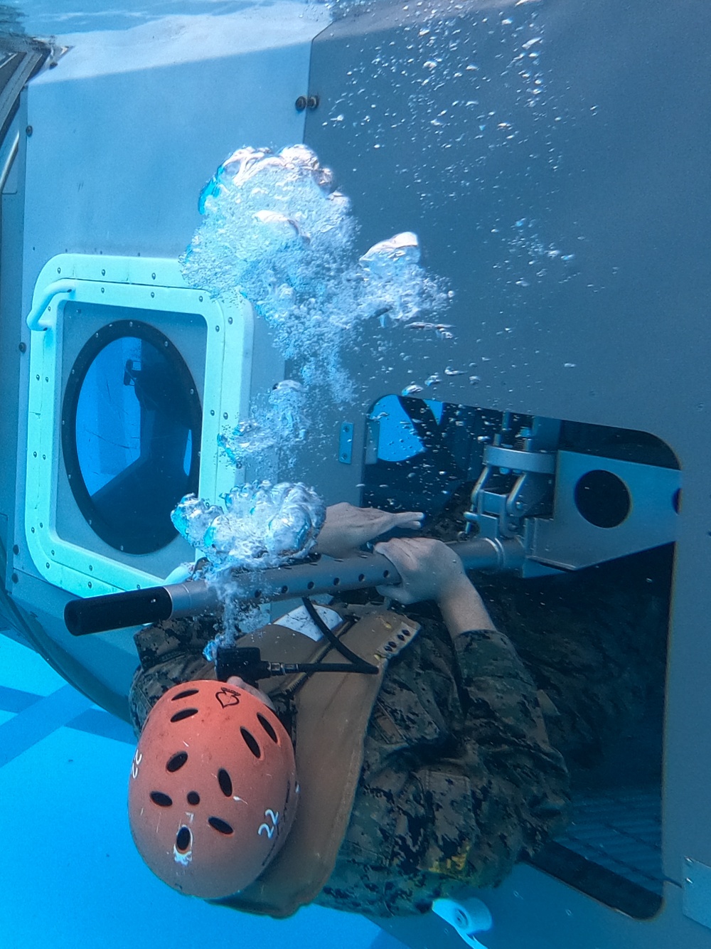 U.S. Marines from III Marine Expeditionary Force conduct Underwater Egress Training