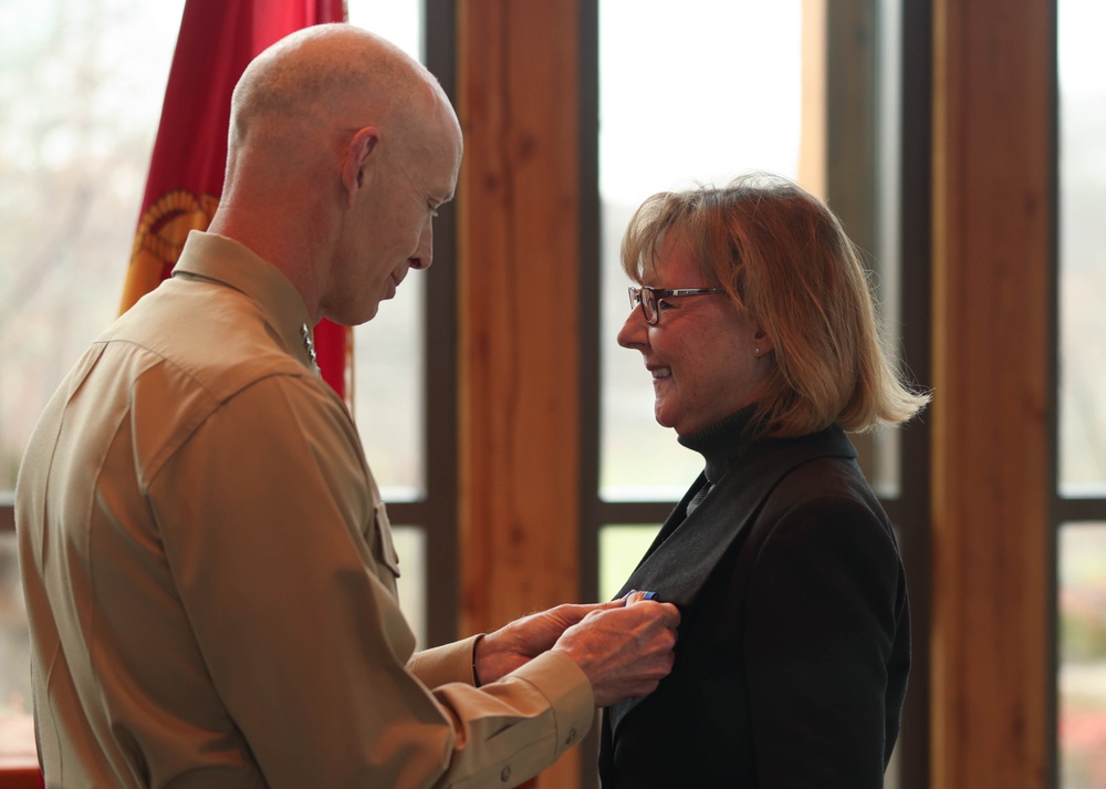 Cindy Whitman Lacy retired by Lt. Gen. Glynn after 34 years of service