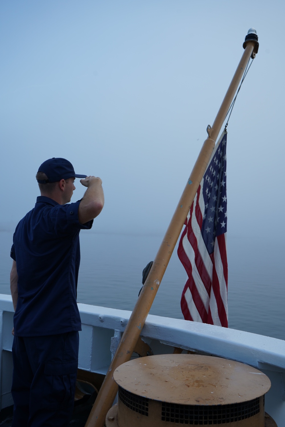 Half masting of national ensign for Rear Adm. Norman Saunders