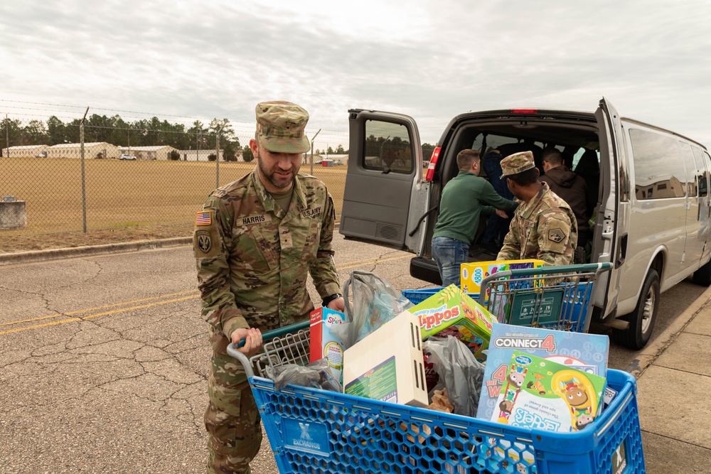 11th CYB delivers toys to Fort Eisenhower Christmas House 03