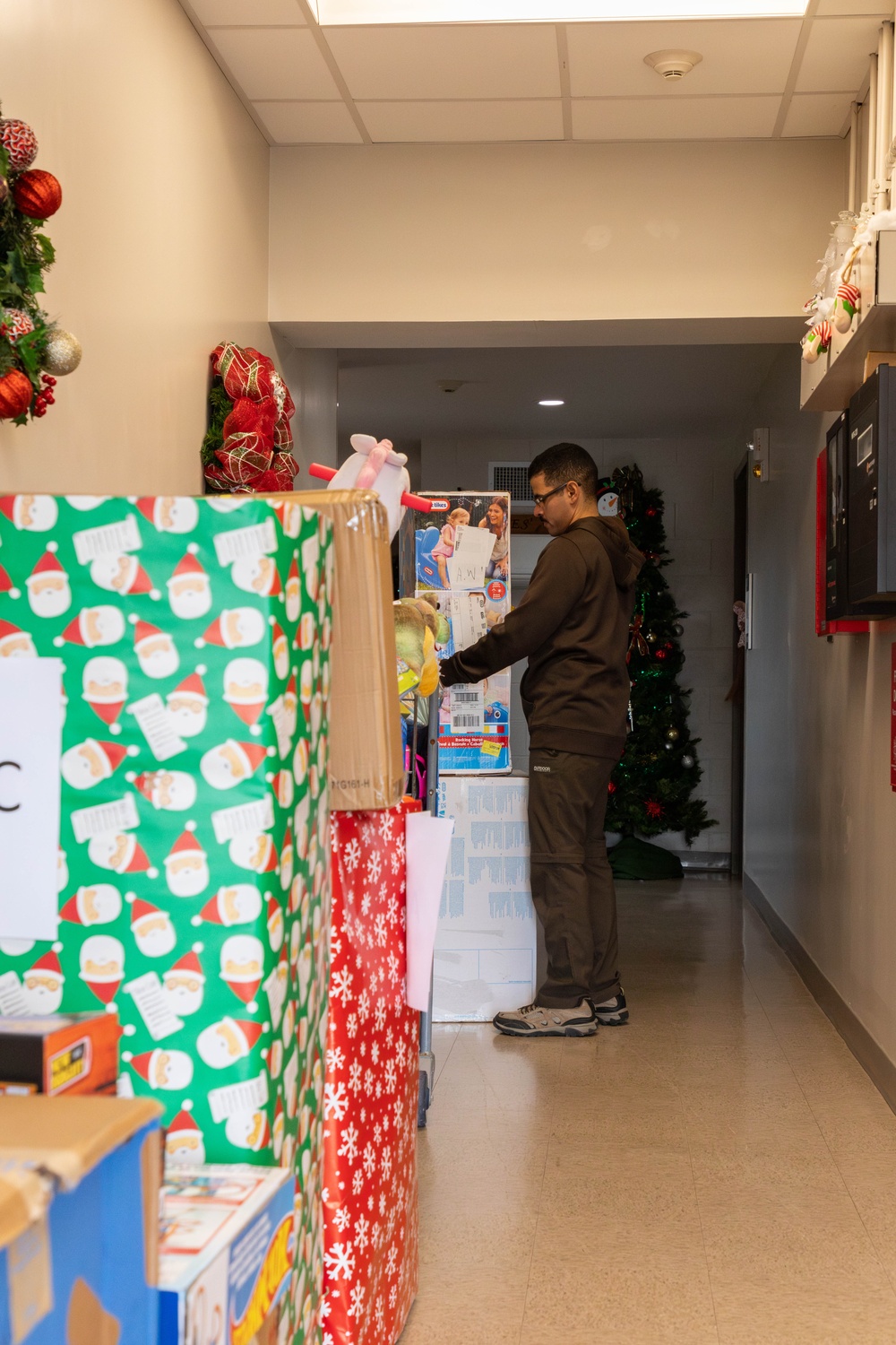 11th CYB delivers toys to Fort Eisenhower Christmas House 13