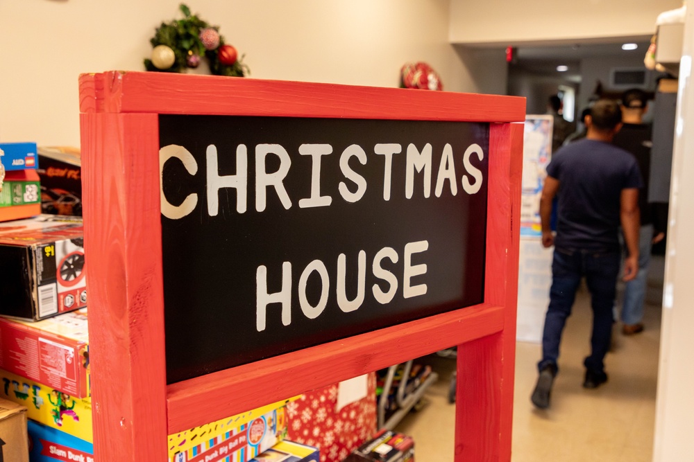 11th CYB delivers toys to Fort Eisenhower Christmas House 18