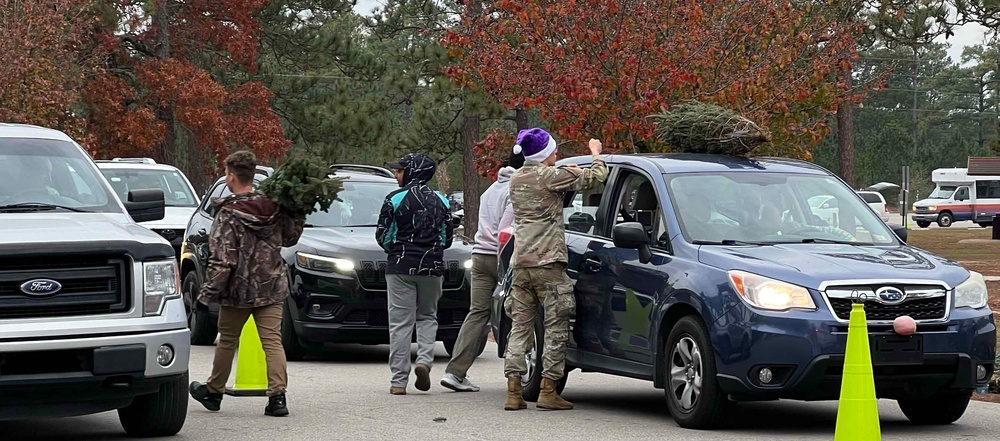 Family of the Year receives 300K donated Christmas Tree