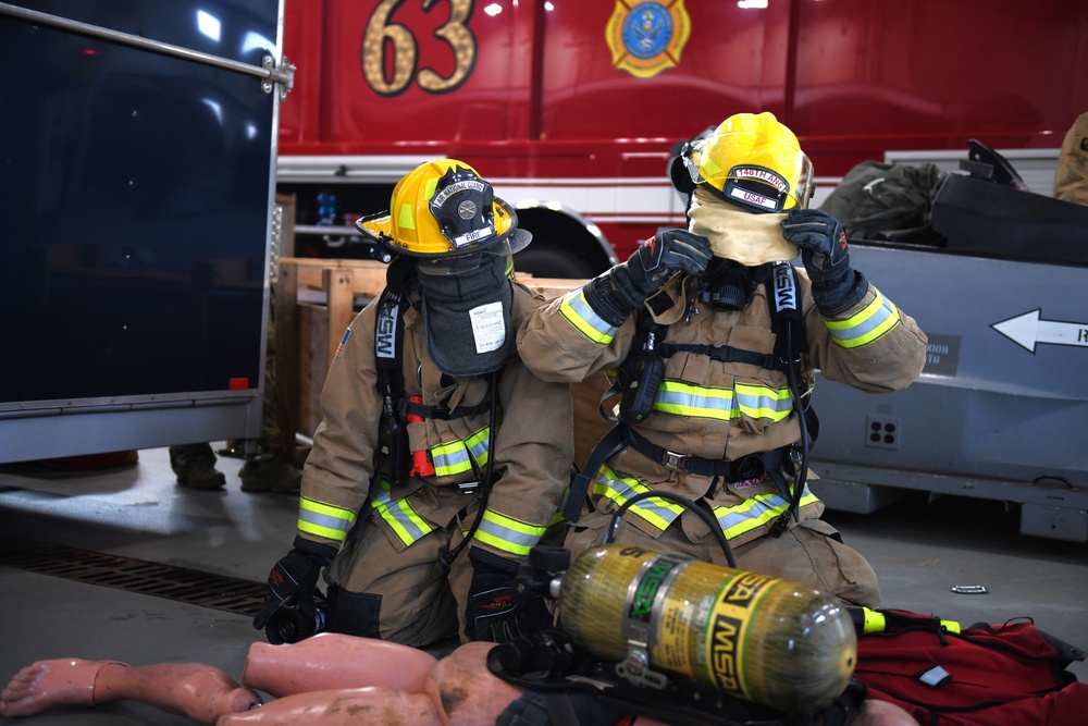 148th Fire Protection Specialists practice rapid intervention team skills