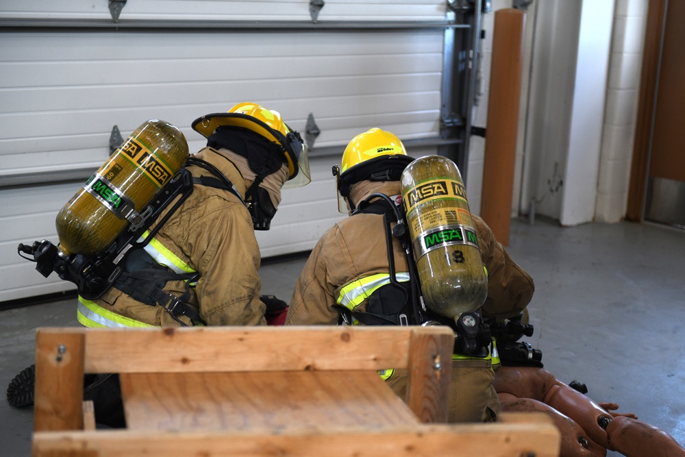 148th Fire Protection Specialists practice rapid intervention team skills