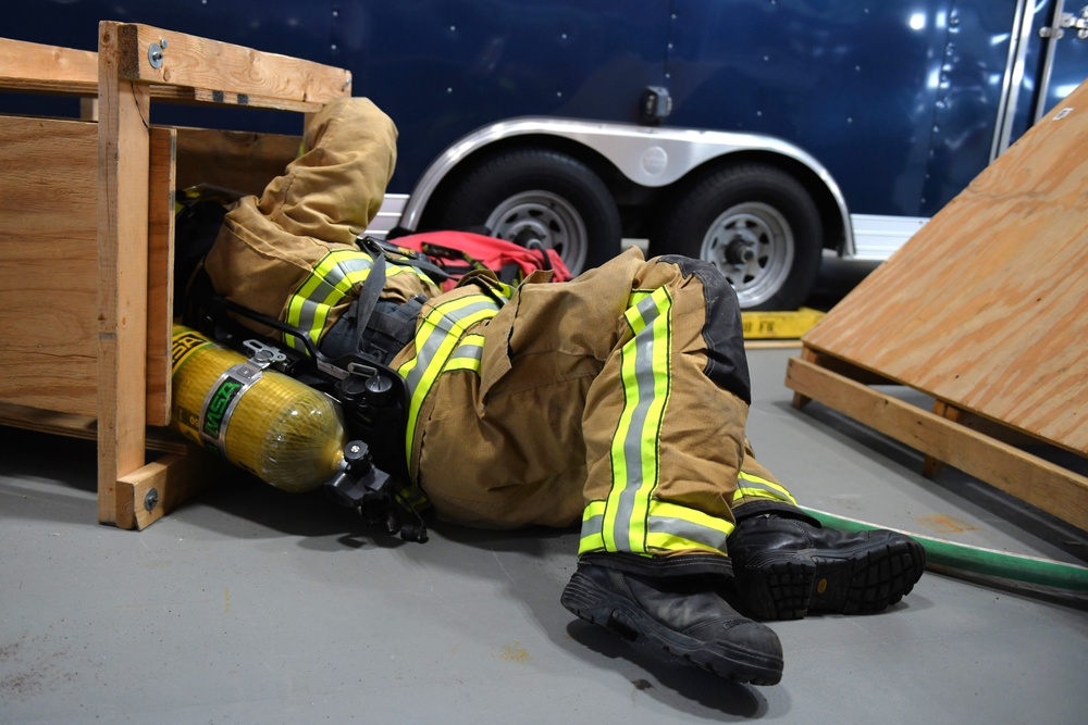 148th Fire Protection Specialists practice rapid intervention team skills