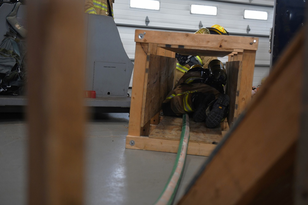 148th Fire Protection Specialists practice rapid intervention team skills