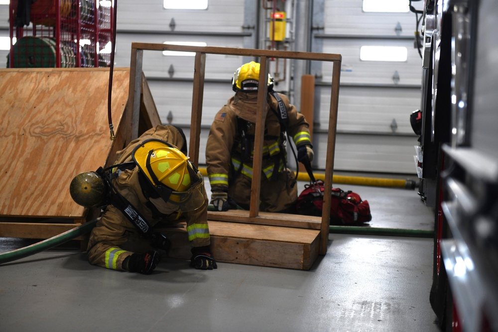 148th Fire Protection Specialists practice rapid intervention team skills