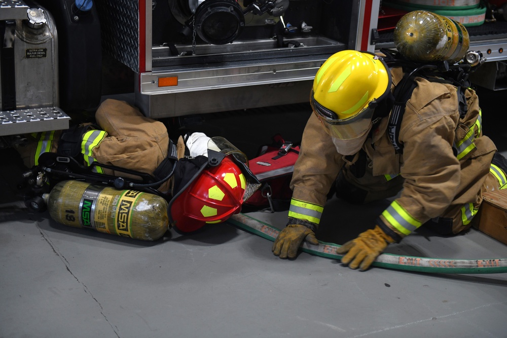 148th Fire Protection Specialists practice rapid intervention team skills