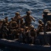 Recon Marines launch from USS Harpers Ferry for VBSS