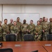 U.S. Air Force Chief Master Sgt. Aaron Dent speaks with first sergeants assigned to the 106th Rescue Wing