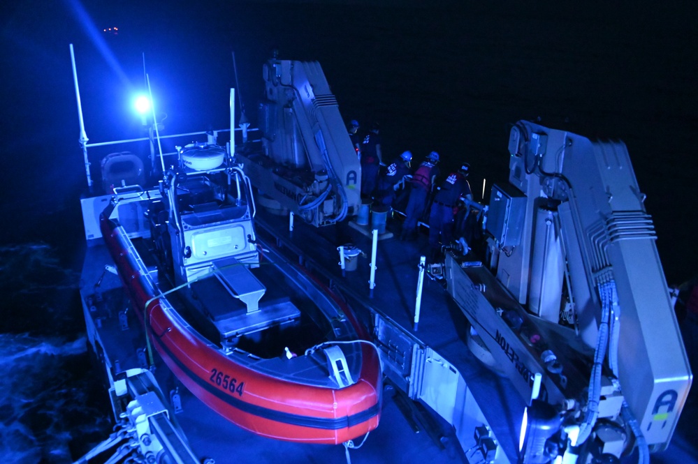 U.S. Coast Guard Cutter Waesche crew members transfer narcotics seized in the Eastern Pacific Ocean