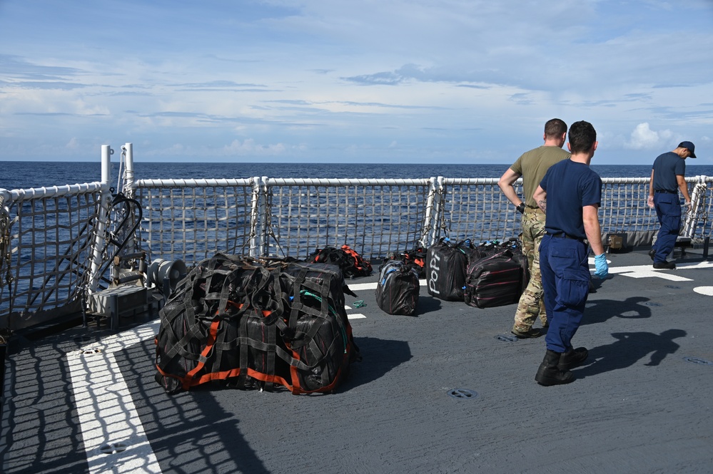 U.S. Coast Guard Cutter Waesche crew members transfer narcotics seized in the Eastern Pacific Ocean