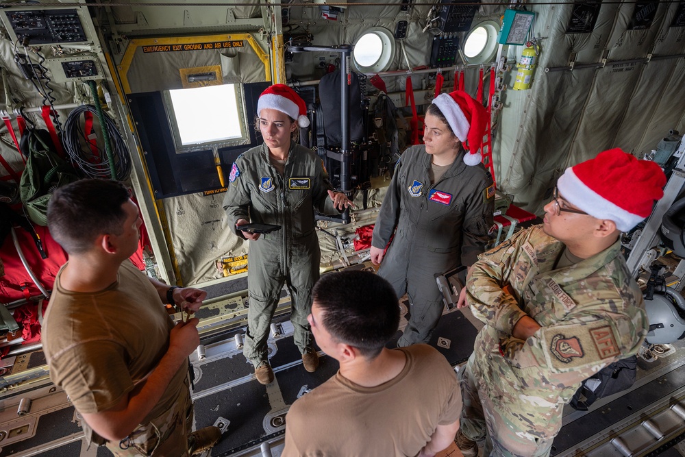 Santa 36: 36th EAS Airmen deliver humanitarian bundles to Satawan Atoll