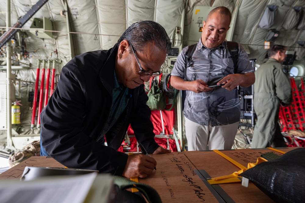 Santa 36: 36th EAS Airmen deliver humanitarian bundles to Satawan Atoll