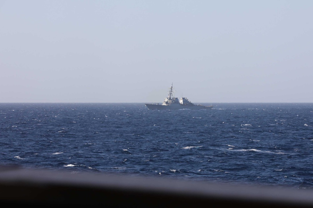 USS Thomas Hudner Conducts Small Boat Operations with USS Carney