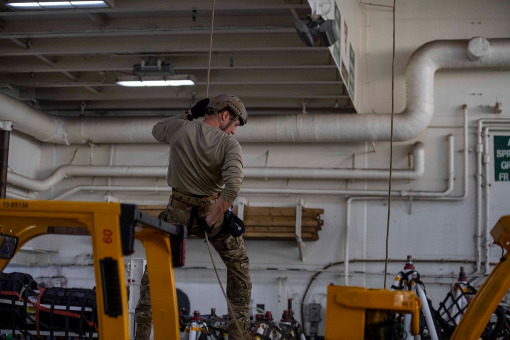 U.S. Navy Explosive Ordnance Disposal Technicians Conducts Helicopter Rope Suspension Technique Training