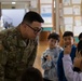 Service members from US, Japan, and Australia greet international students in Hokkaido