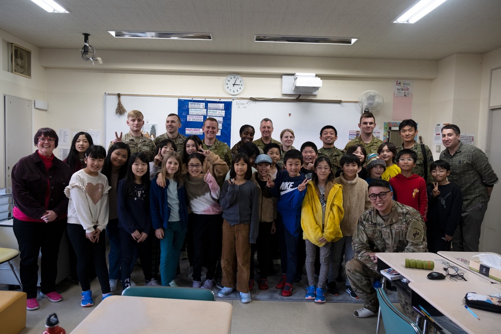 Service members from US, Japan, and Australia greet international students in Hokkaido