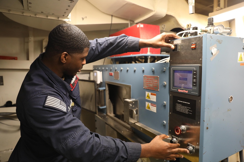 Ramage Sailor Operates Dryer