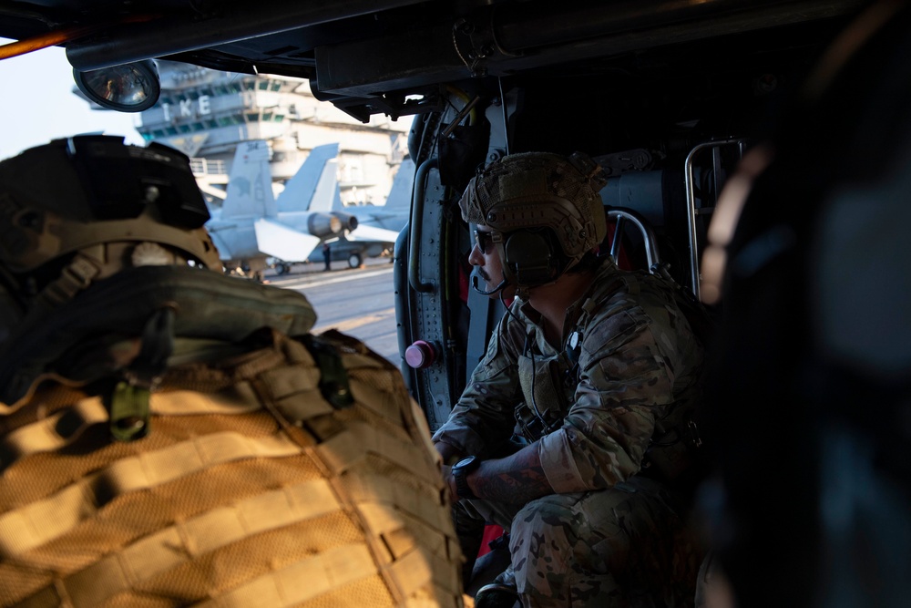 U.S. Navy Explosive Ordnance Disposal Technicians Conduct Helicopter Rope Suspension Drills