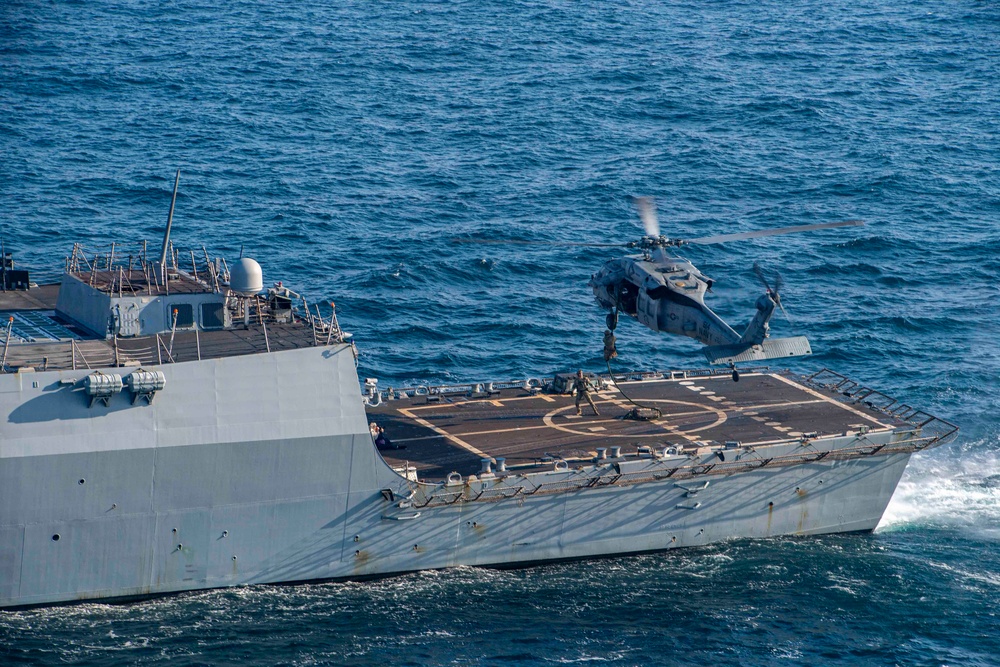 U.S. Navy Explosive Ordnance Disposal Technicians Conduct Helicopter Rope Suspension Drills