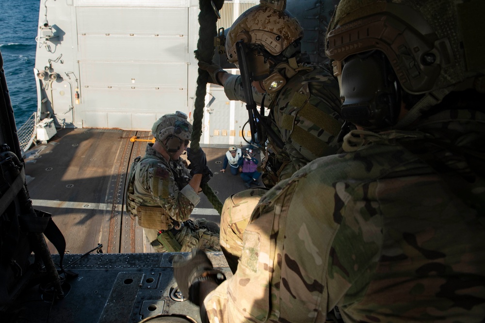 U.S. Navy Explosive Ordnance Disposal Technicians Conduct Helicopter Rope Suspension Drills