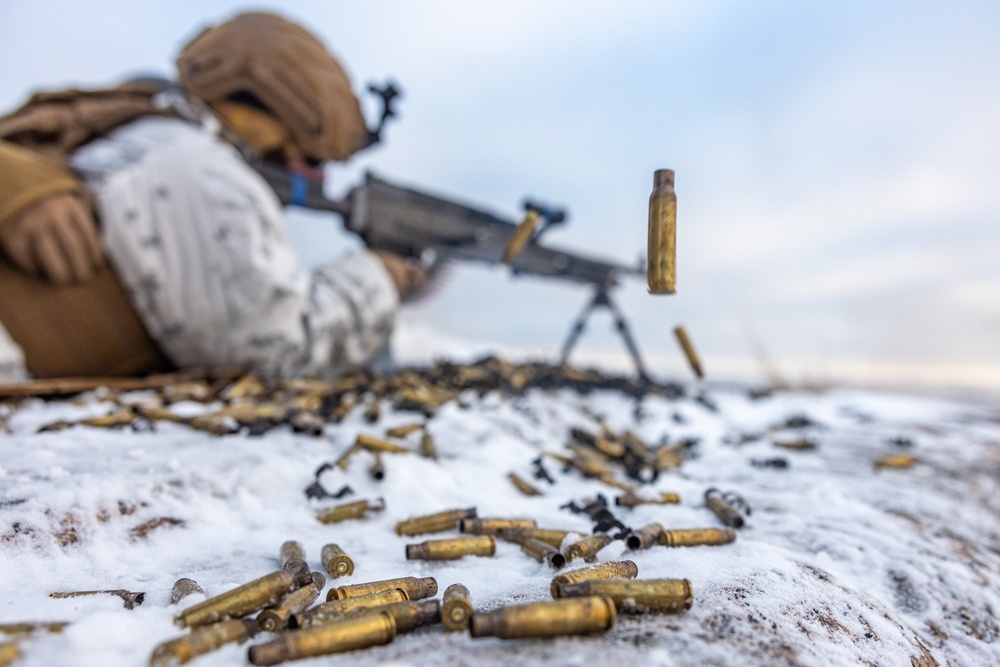 Marines Assigned to Combat Logistics Battalion 6 Conduct a Live Fire Machine Gun Range in Finland