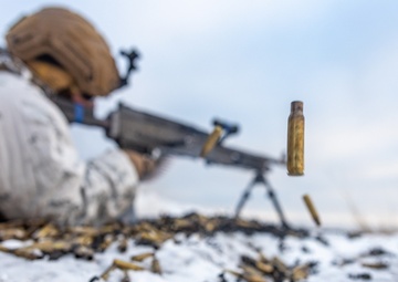 Marines Assigned to Combat Logistics Battalion 6 Conduct a Live Fire Machine Gun Range in Finland