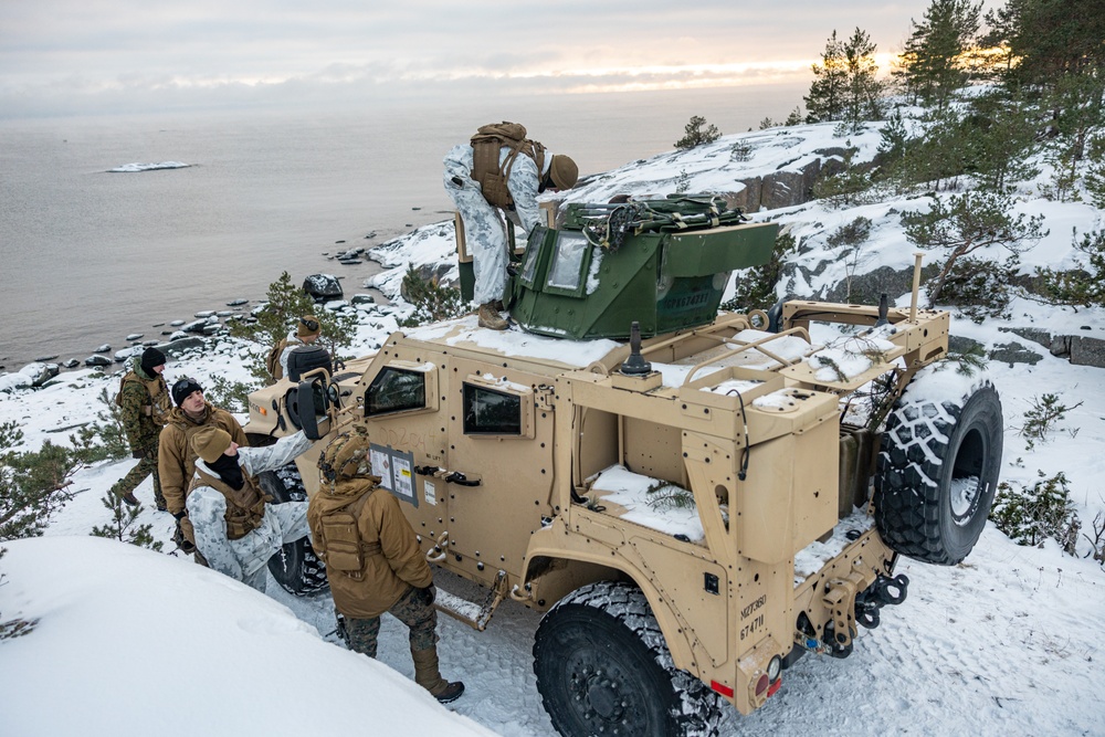 Marines Assigned to Combat Logistics Battalion 6 Conduct a Live Fire Machine Gun Range in Finland