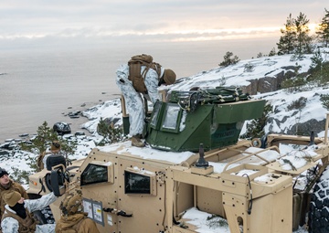 Marines Assigned to Combat Logistics Battalion 6 Conduct a Live Fire Machine Gun Range in Finland