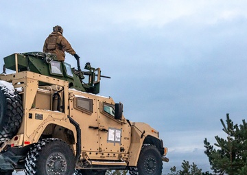 Marines Assigned to Combat Logistics Battalion 6 Conduct a Live Fire Machine Gun Range in Finland