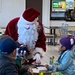 Santa Claus delights children of all ages at the NEX