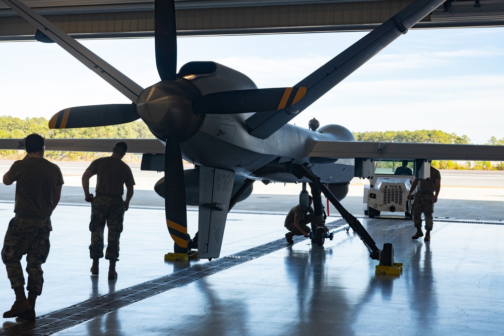 U.S. Marines with VMUT-2 conduct joint training with U.S. Air Force Airmen with the 174th Attack Wing